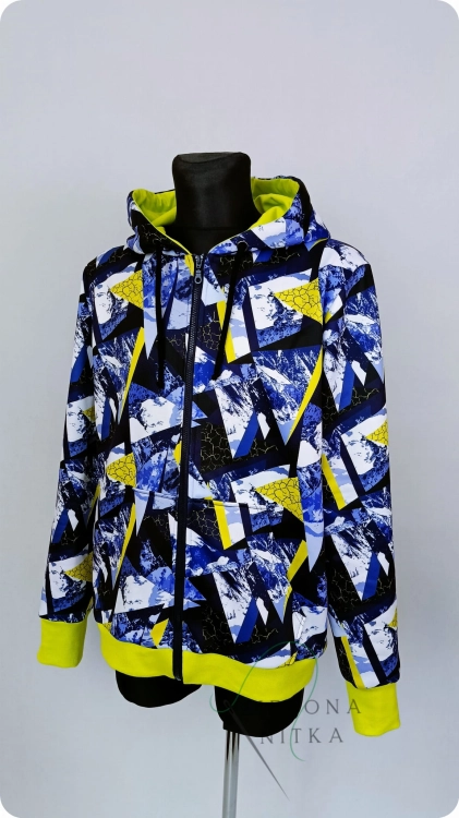 Bluza męska rozpinana GEOMETRIA z meszkiem, ocieplana i wodoodporna. Duży kaptur, kieszenie i zamek z przodu. Materiał: 50% bawełna, 50% poliester. Komfortowa i stylowa.