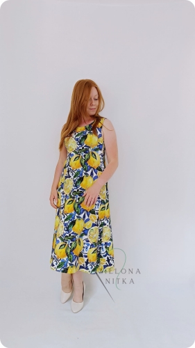 Letnia sukienka LILY w kolorze cytrynowym. Krój A, dopasowana góra, okrągły dekolt, grube ramiączka, tradycyjne podwinięcie dołu. Materiał: 97% bawełna, 3% elastan.